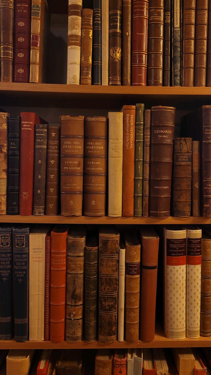 Moody niche perfume scene with books and wood
